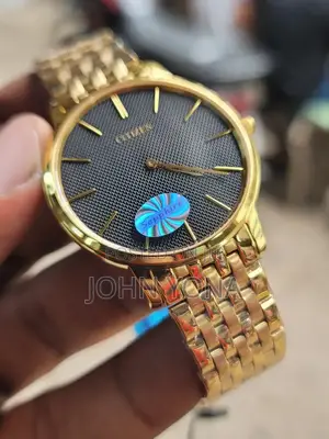 Citizen Wristwatch With a Black, Textured Dial
