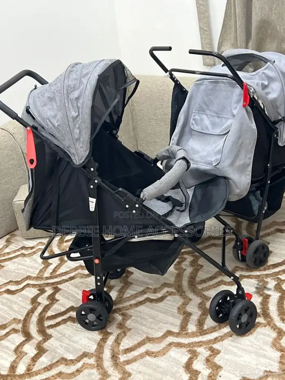 Gray and Black Umbrella Baby Stroller.