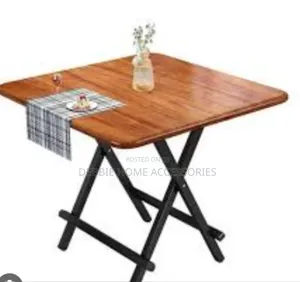 Portable Foldable Dining Table With a Wooden Top and Black Metal Legs