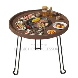 A Portable, Multifunctional Charcoal Barbecue Grill Table.