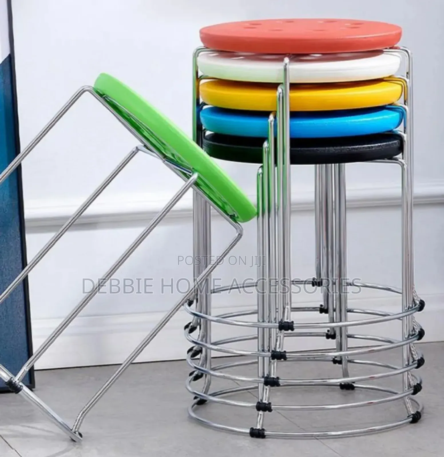 Round Stools With a Metal Frame and Plastic Seat Tops.