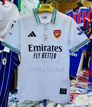 Arsenal 25/26 Terrace Icons Long-Sleeve Polo Shirt in White.