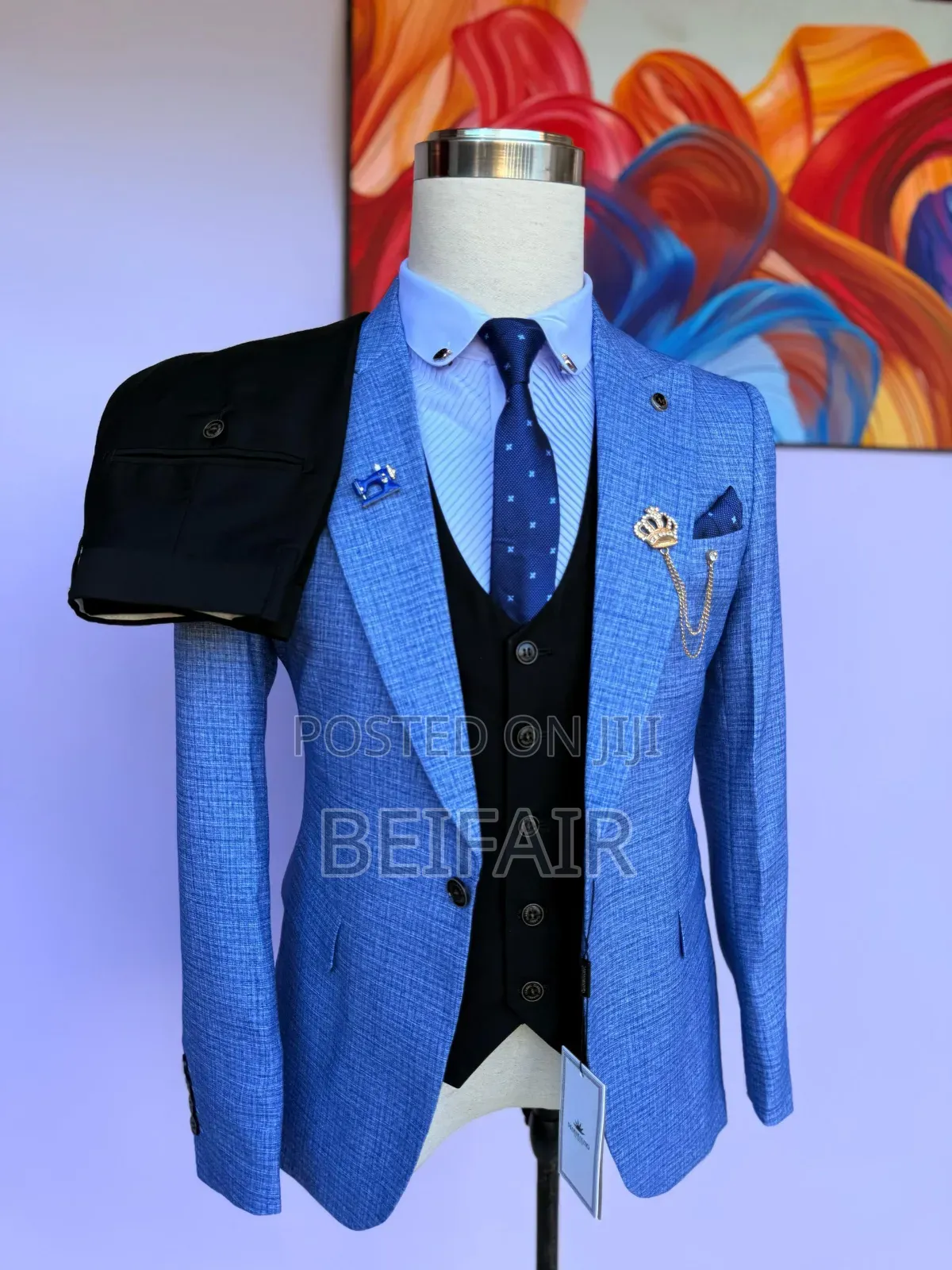 Light Blue Jacket and Black Tro Suit