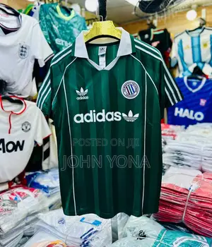 Adidas Originals Football Jersey in Green With White Stripes.
