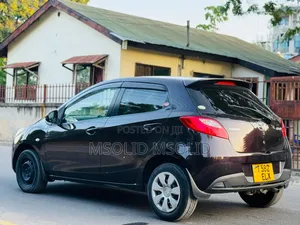 Mazda Demio 2009 Burgundy