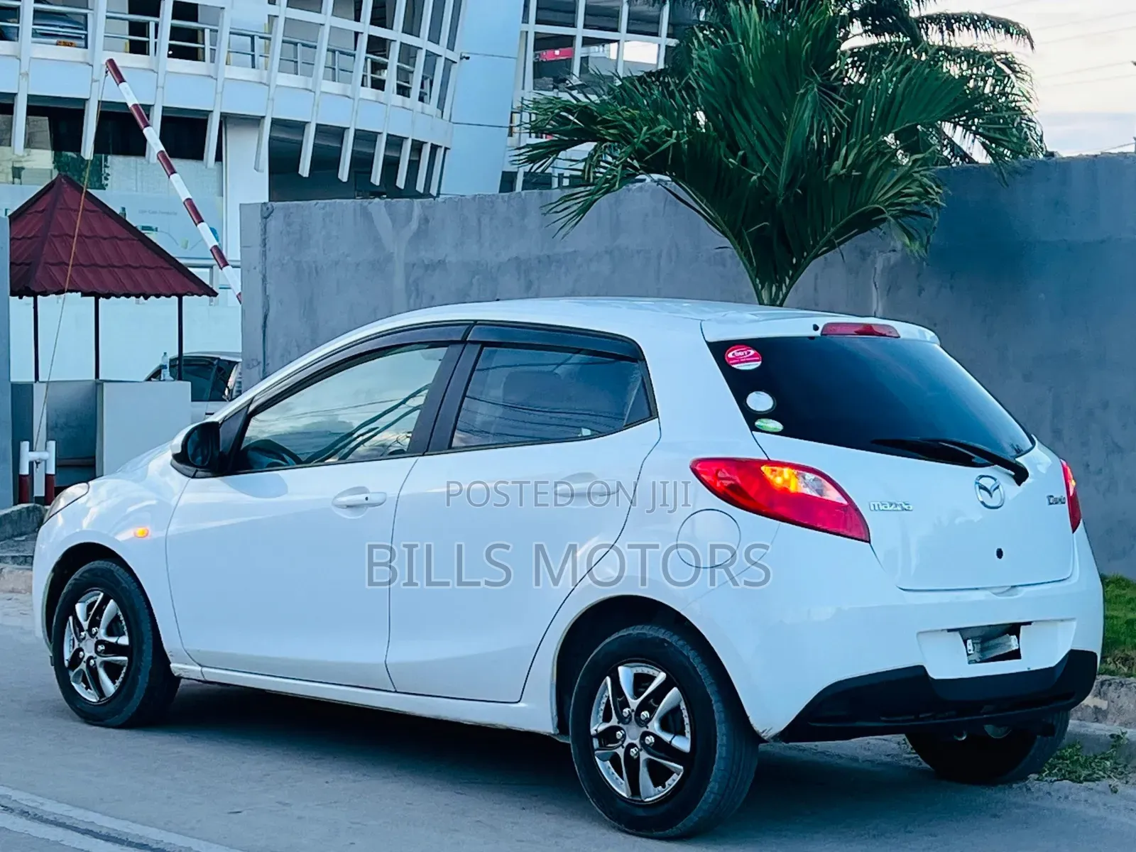 Mazda Demio 2009 White in Kinondoni - Cars, Bills Motors | Jiji.co.tz