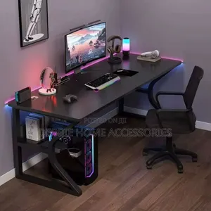 Black Computer Gaming Desk With a C-Shaped Leg Design. (140*60cm)
