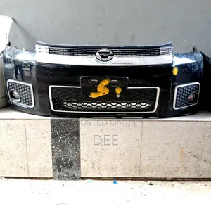 This Is a Black Front Bumper Assembly for a Toyota Corolla Rumion.