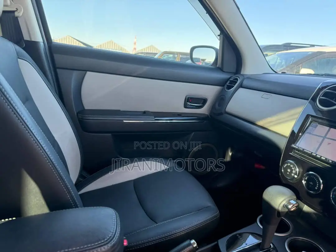 Mazda Verisa 2011 Red
