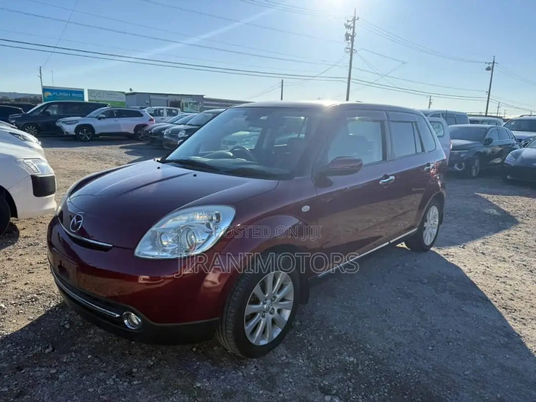 Mazda Verisa 2011 Red