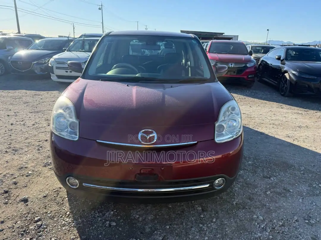 Mazda Verisa 2011 Red