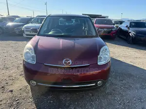 Mazda Verisa 2011 Red