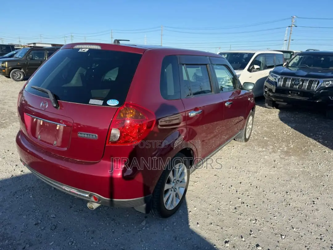 Mazda Verisa 2011 Red