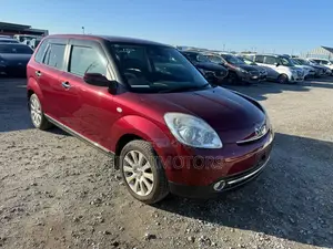 Mazda Verisa 2011 Red