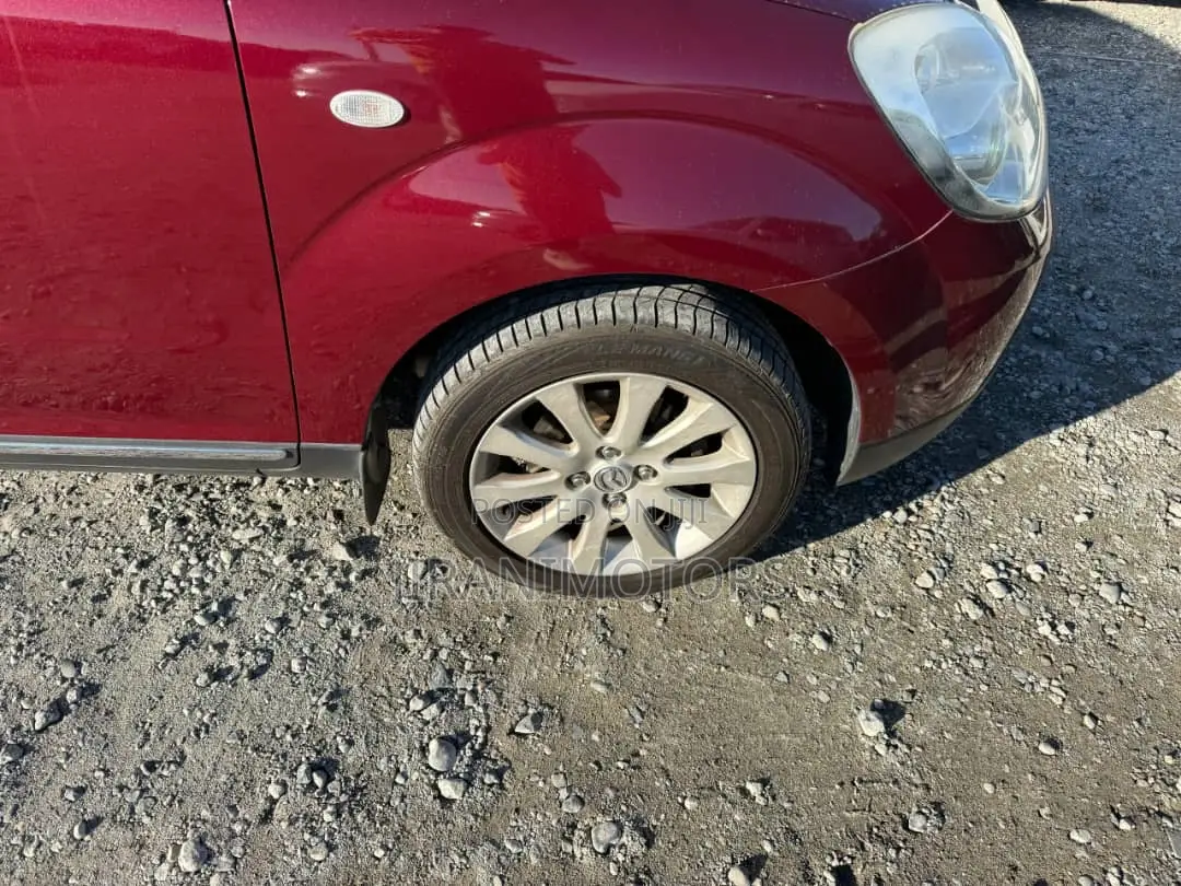 Mazda Verisa 2011 Red