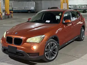 BMW X1 sDrive28i 4dr SUV (2.0L 4cyl Turbo 8A) 2014 Orange