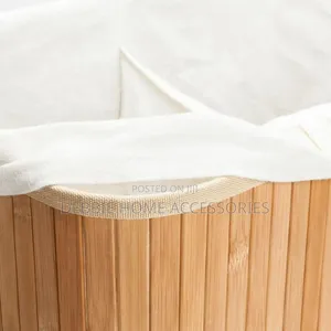 Natural Bamboo Laundry Hamper With a Lid and Rope Handles.