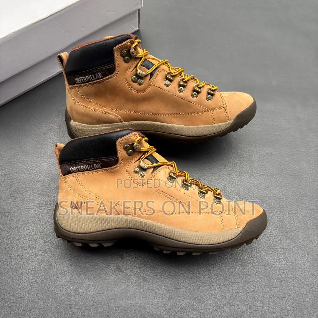 This Is a Pair of Caterpillar Work Boots,