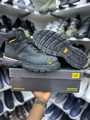 This Is a Pair of Black Caterpillar Excavator Safety Boots