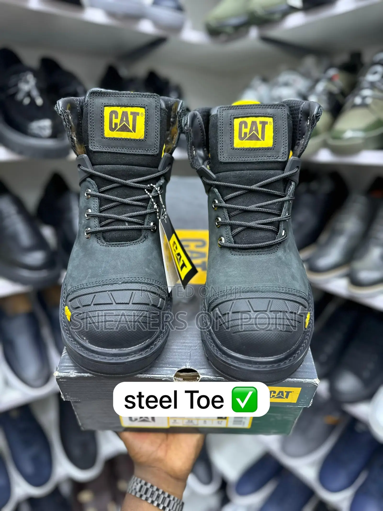 This Is a Pair of Black Caterpillar Excavator Safety Boots