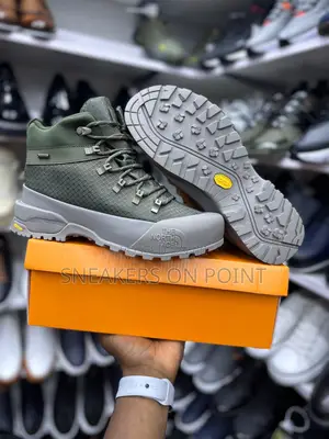 This Is a Pair of the North Face Glenclyffe Low Boots in a Green