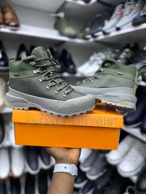 This Is a Pair of the North Face Glenclyffe Low Boots in a Green