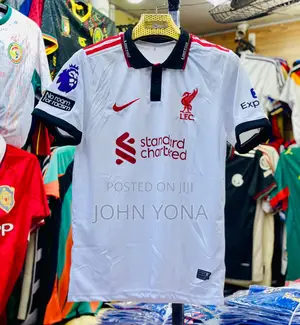 Liverpool Fc Football Jersey With a Black Collar