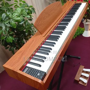3 Pedal Digital Piano . Colour Brown, Orange, Black .