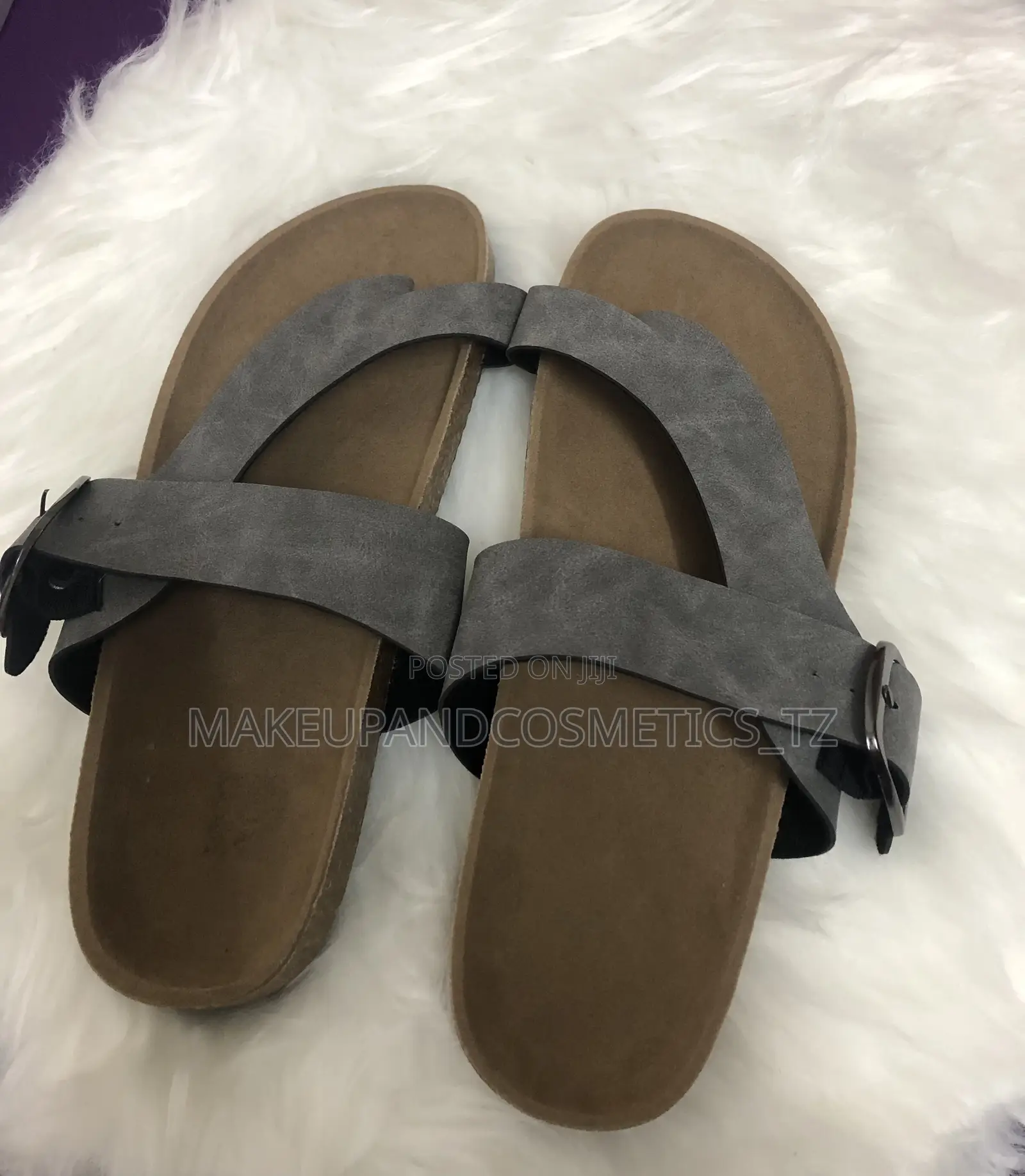 Pair of Sandals in a Grey
