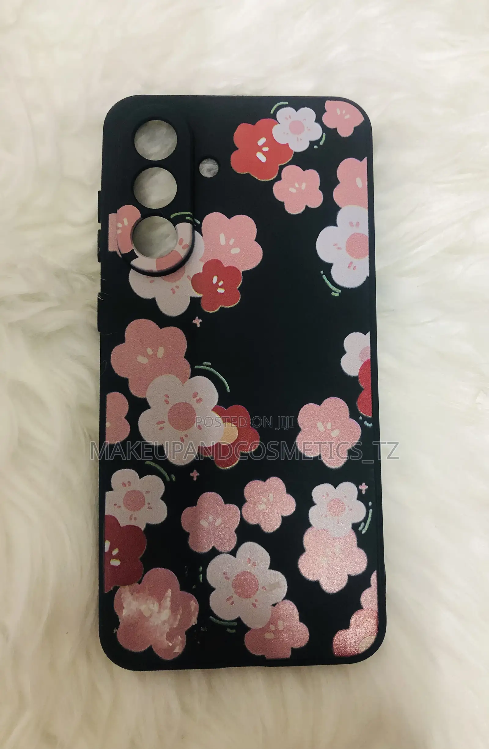 Black Phone Case With a Pink and White Floral