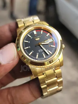 Seiko 5 Snkk22k1 Automatic Watch With a Black Dial and Gold-Tone