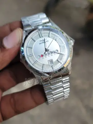 Domnio Analog Watch, Likely a Model With a Day and Date Display.