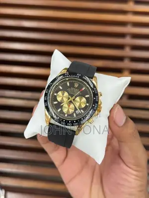 Rolex Cosmograph Daytona in 18 Ct Yellow Gold Case With a Black Dial