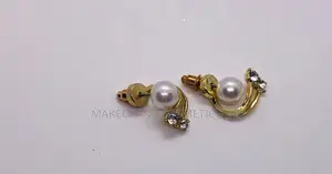 Pair of Gold-Toned Pearl Earrings