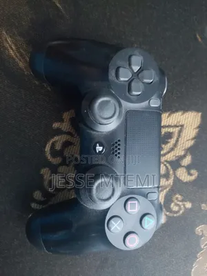 Used Playstation 4 Black Controller With Good Condition, No Problems