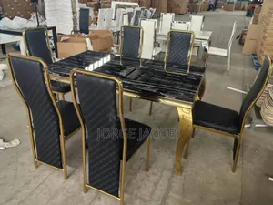 Modern Marble Dining Table With a Gold-Finished Stainless Steel Base