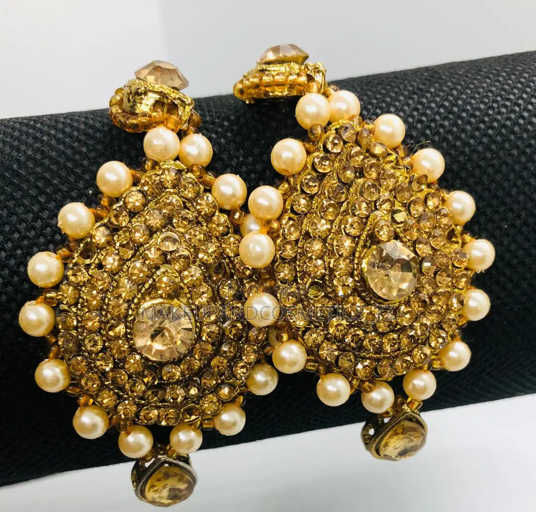 Pair of Gold-Toned Indian Earrings