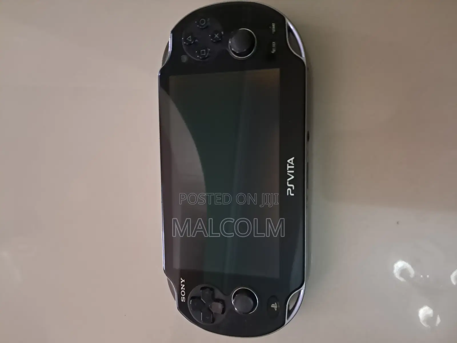 New Ps Vita Comes With 4 Games Memory Card and Charger