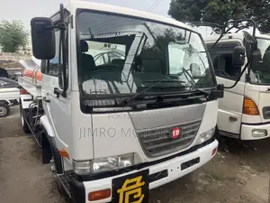  Vehicle Specifications: • Model: Nissan Diesel Condor Ud Oil T