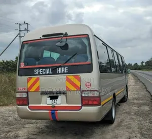 Toyota Coaster 2003 Gold