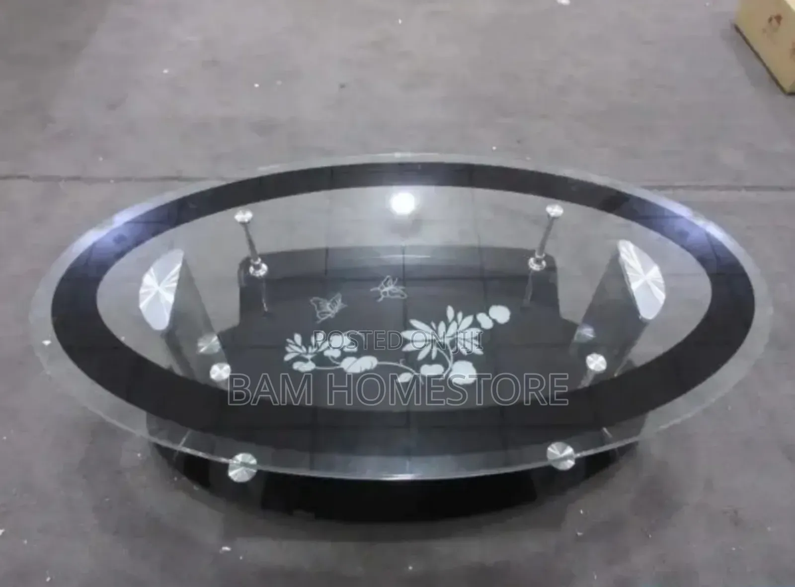 Luxury Oval Glass Coffee Table With Floral Design and Gold/Chrome Legs