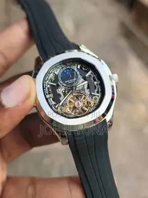 Patek Philippe Timepiece, Skeletoni Dial and a Black Rubber Strap
