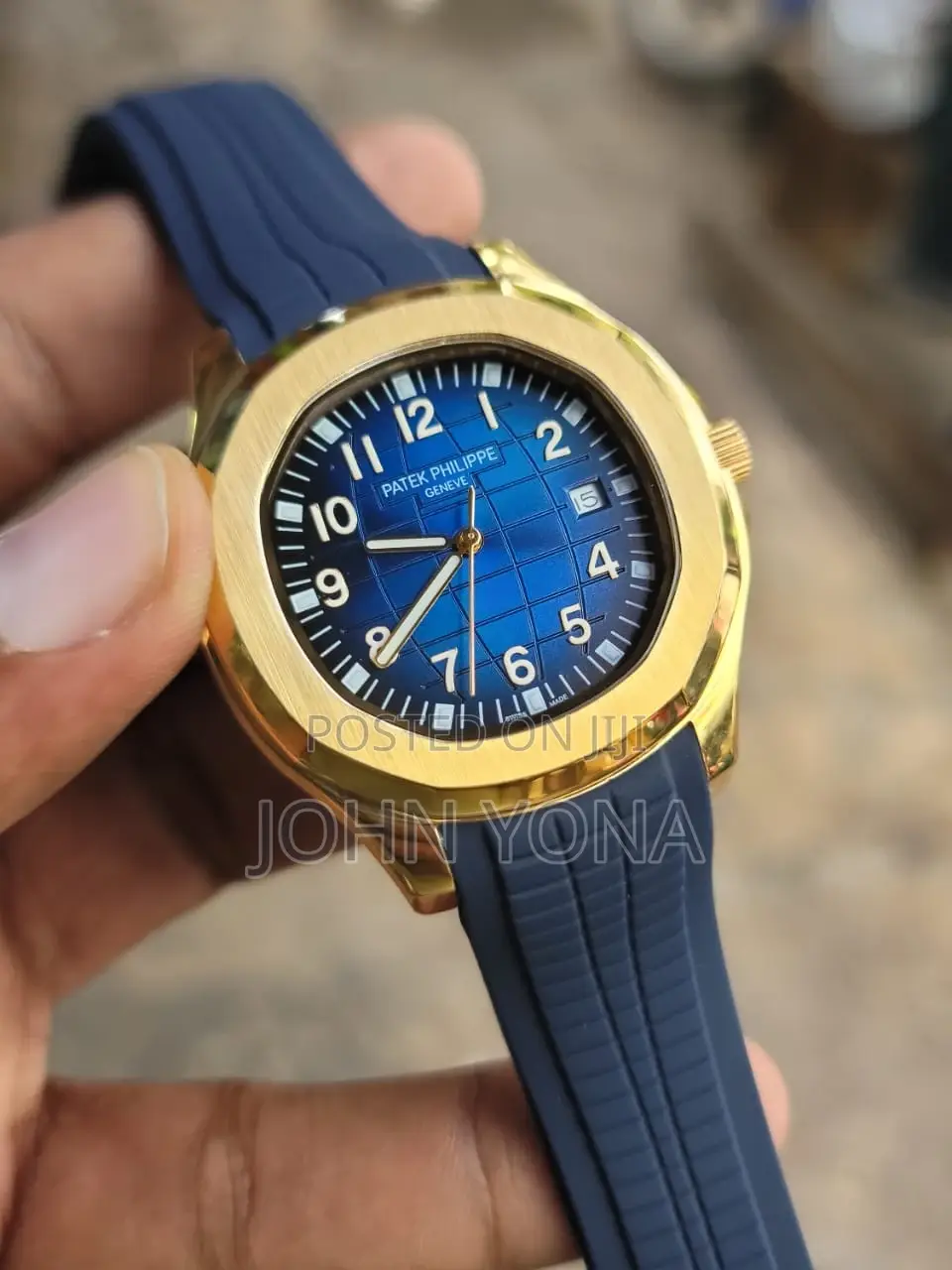 Patek Philippe Aquanaut With a Gold Case and a Blue Dial