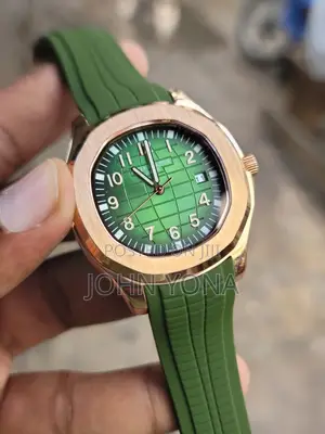 Patek Philippe Aquanaut Model With a Rose Gold Case and a Green Dial