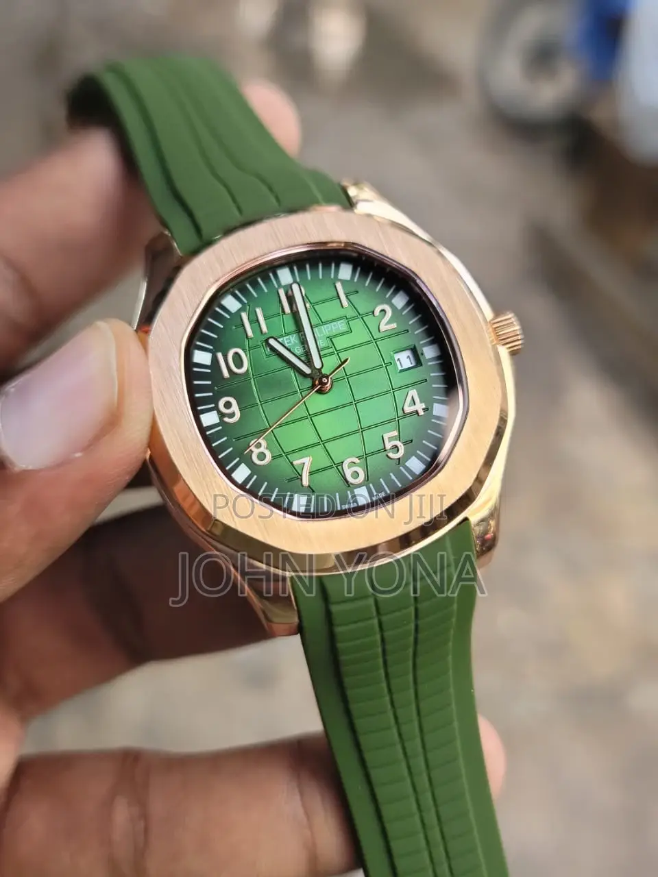 Patek Philippe Aquanaut Model With a Rose Gold Case and a Green Dial