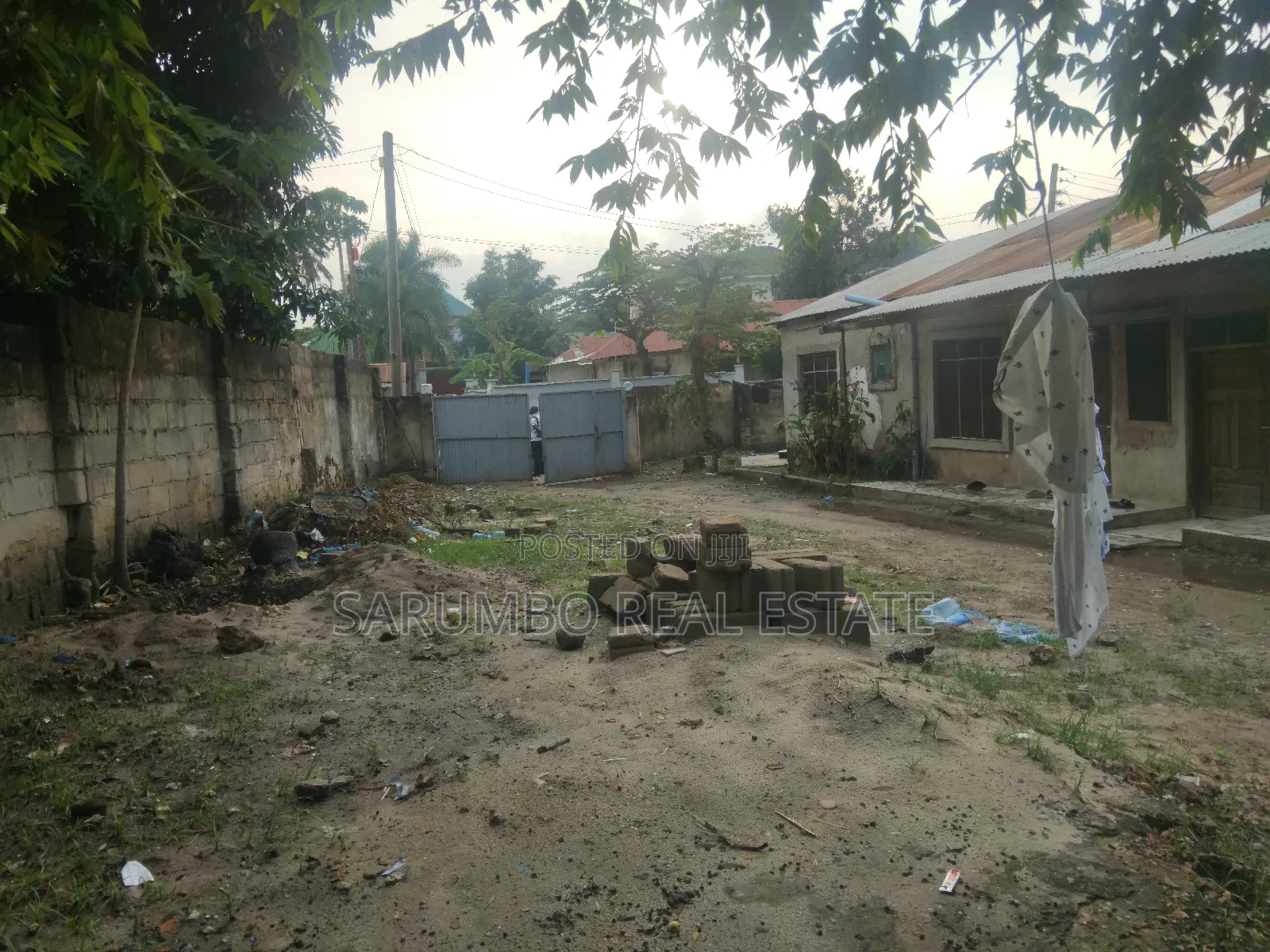 Kiwanja Chenye Nyumba Za Wapangaji Kinauzwa Mbezi Beach