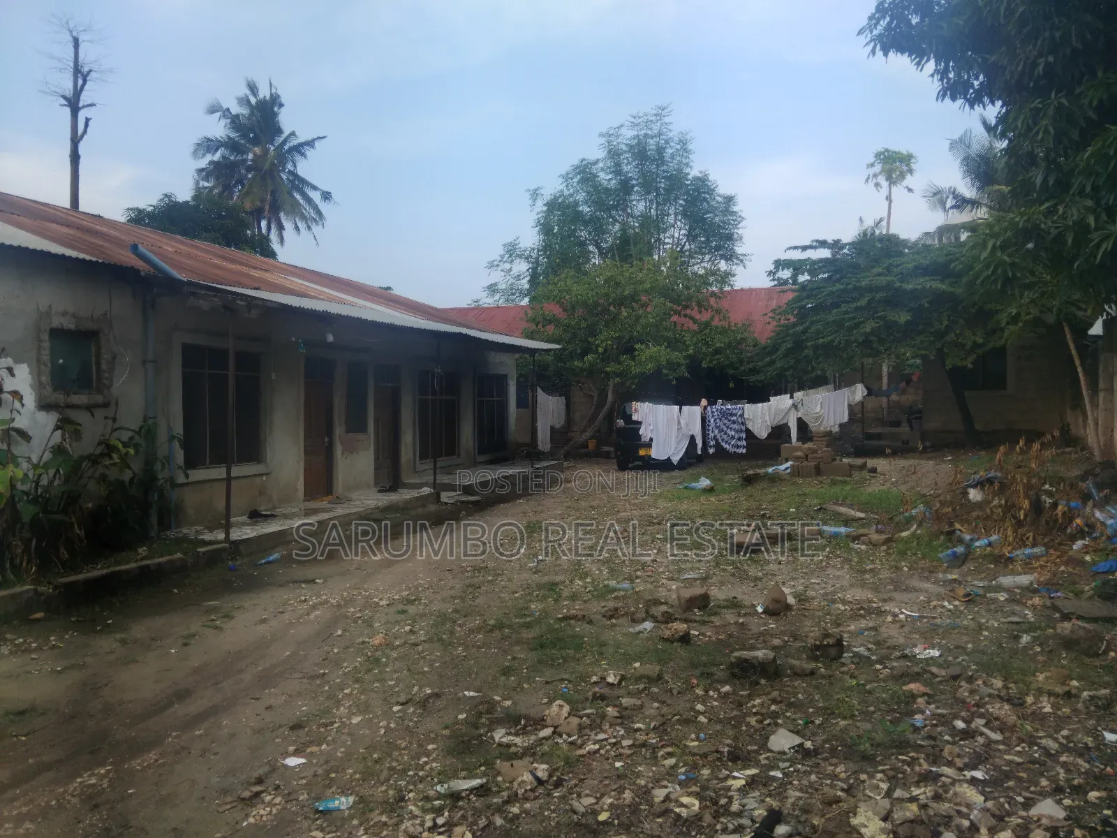 Kiwanja Chenye Nyumba Za Wapangaji Kinauzwa Mbezi Beach