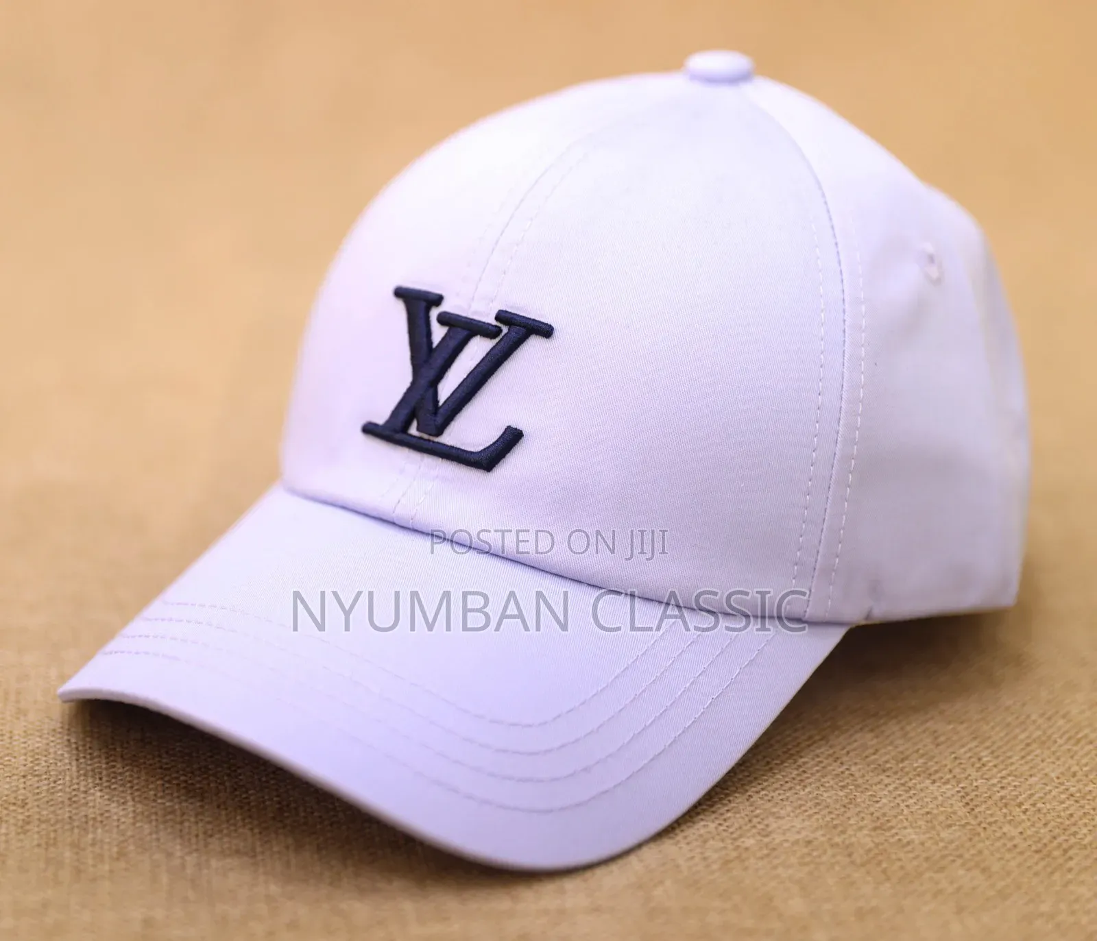 Caps Lou's Vuitton