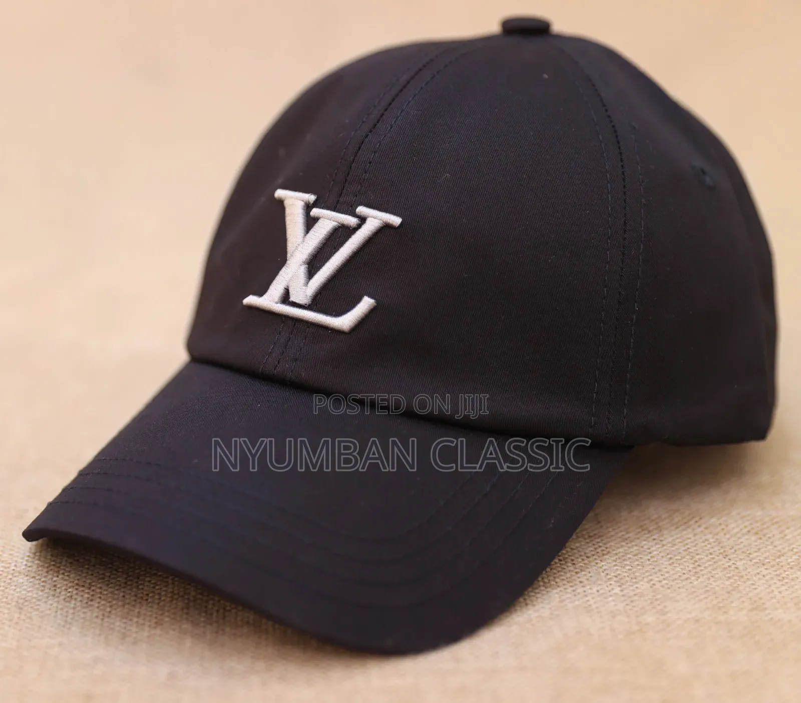 Caps Lou's Vuitton