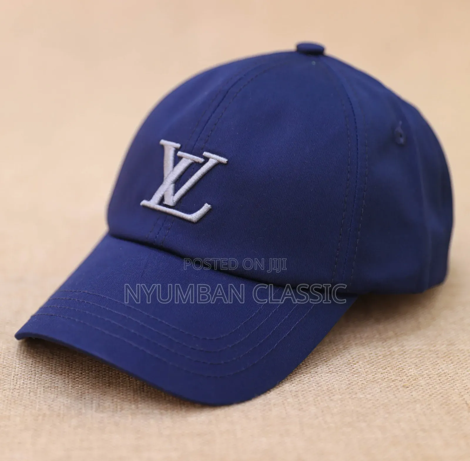 Caps Lou's Vuitton